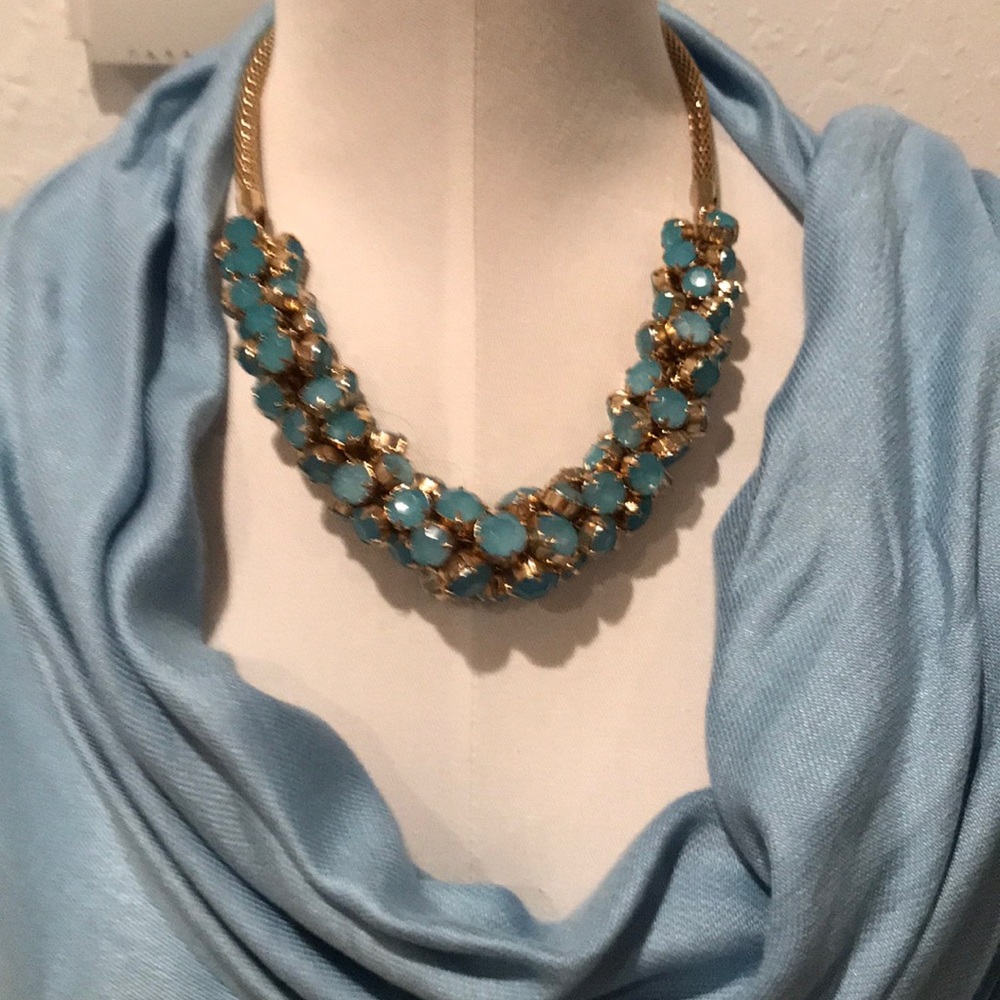 Light blue glass like choker Never worn.